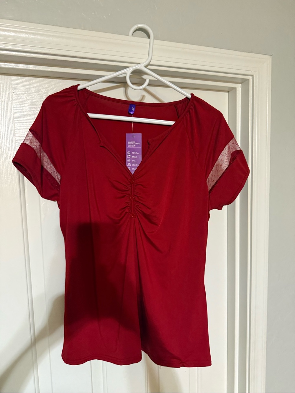 $6 Women’s Red Ruched V-Neck Short Sleeve Top $6 WHEN BUNDLED WITH 3 OR MORE ITE - Picture 2 of 10